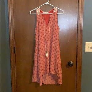 Miami brand sleeveless high-low dress.